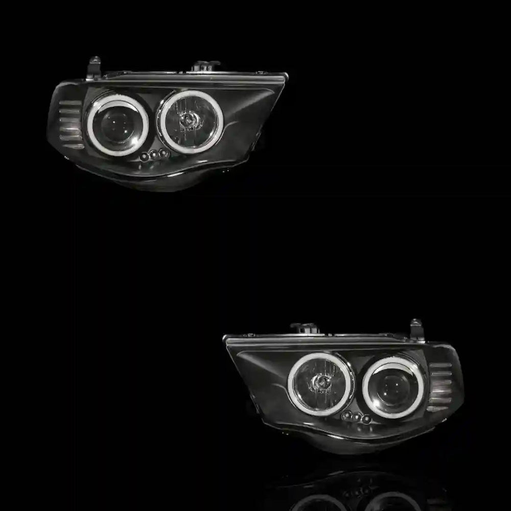 
                  
                    Black Series Halo Angel Eyes Projector Headlights – Fits Mitsubishi Triton ML MN (2006 - 2015) | LH + RH Pair - Blckline Automotive
                  
                