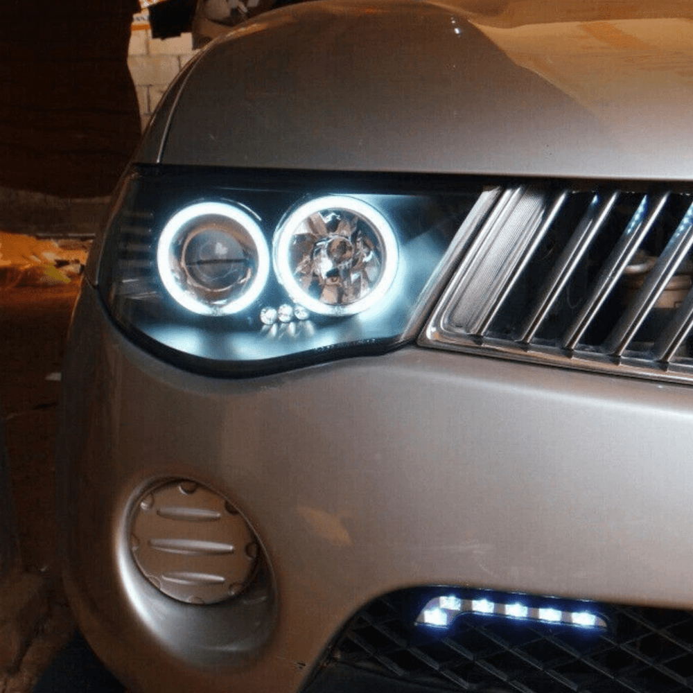 Black Series Halo Angel Eyes Projector Headlights – Fits Mitsubishi Triton ML MN (2006 - 2015) | LH + RH Pair - Blckline Automotive