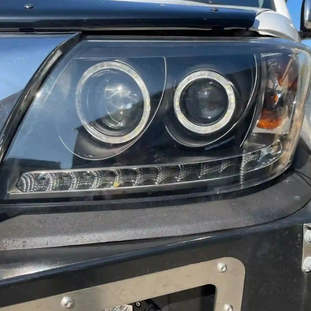 
                  
                    Halo Angel Eyes Projector Headlights – Fits Toyota Hilux N70 (2005 - 2015) | LH + RH Pair - Blckline Automotive
                  
                