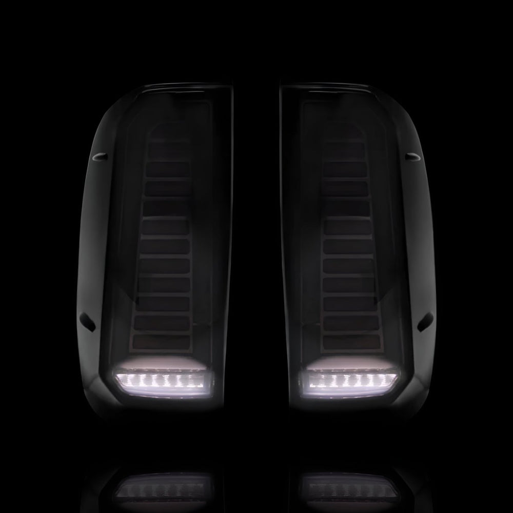 
                  
                    Scarlet Sequential Smoked Tail Lights – Fits Toyota Hilux N70 (2007–2015) | LH + RH Pair - Blckline Automotive
                  
                