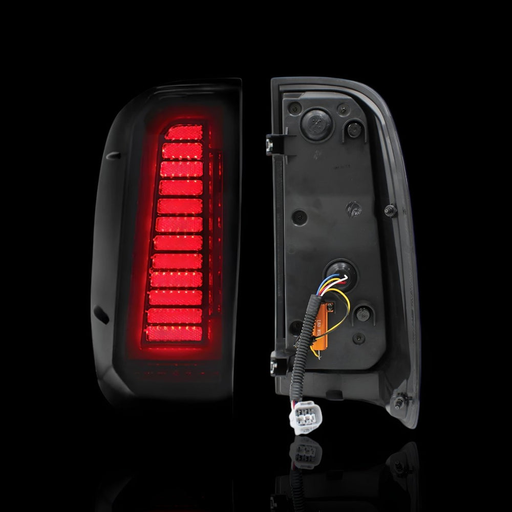 
                  
                    Scarlet Sequential Smoked Tail Lights – Fits Toyota Hilux N70 (2007–2015) | LH + RH Pair - Blckline Automotive
                  
                