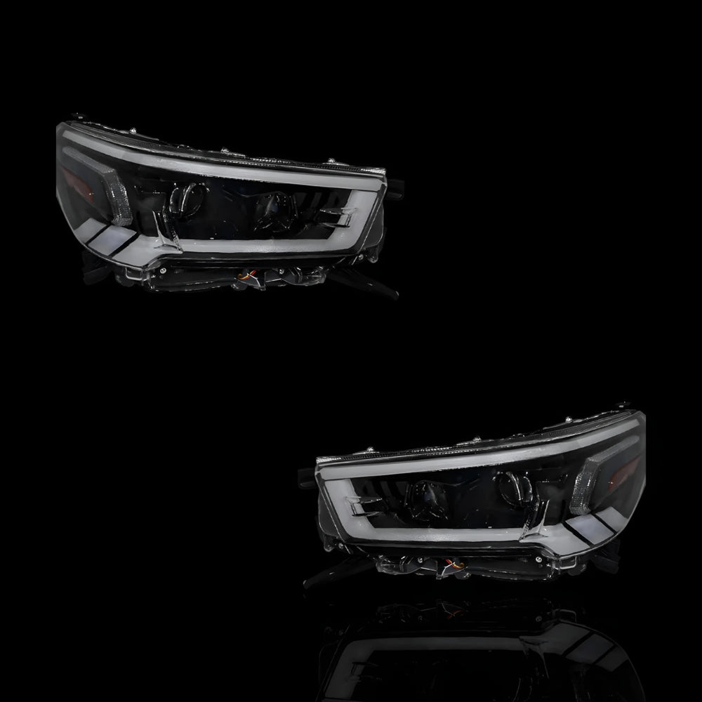 
                  
                    Sequential DRL Projector Headlights – Fits Toyota Hilux N80 (2020–2024) | LH + RH Pair - Blckline Automotive
                  
                