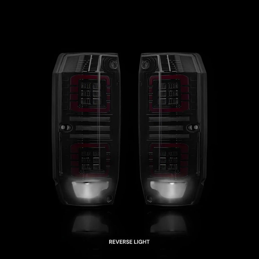 
                  
                    Sequential Halo LED Tail Lights – Fits Toyota LandCruiser 76 / 78 Series (2007–2022) | LH + RH Pair - Blckline Automotive
                  
                