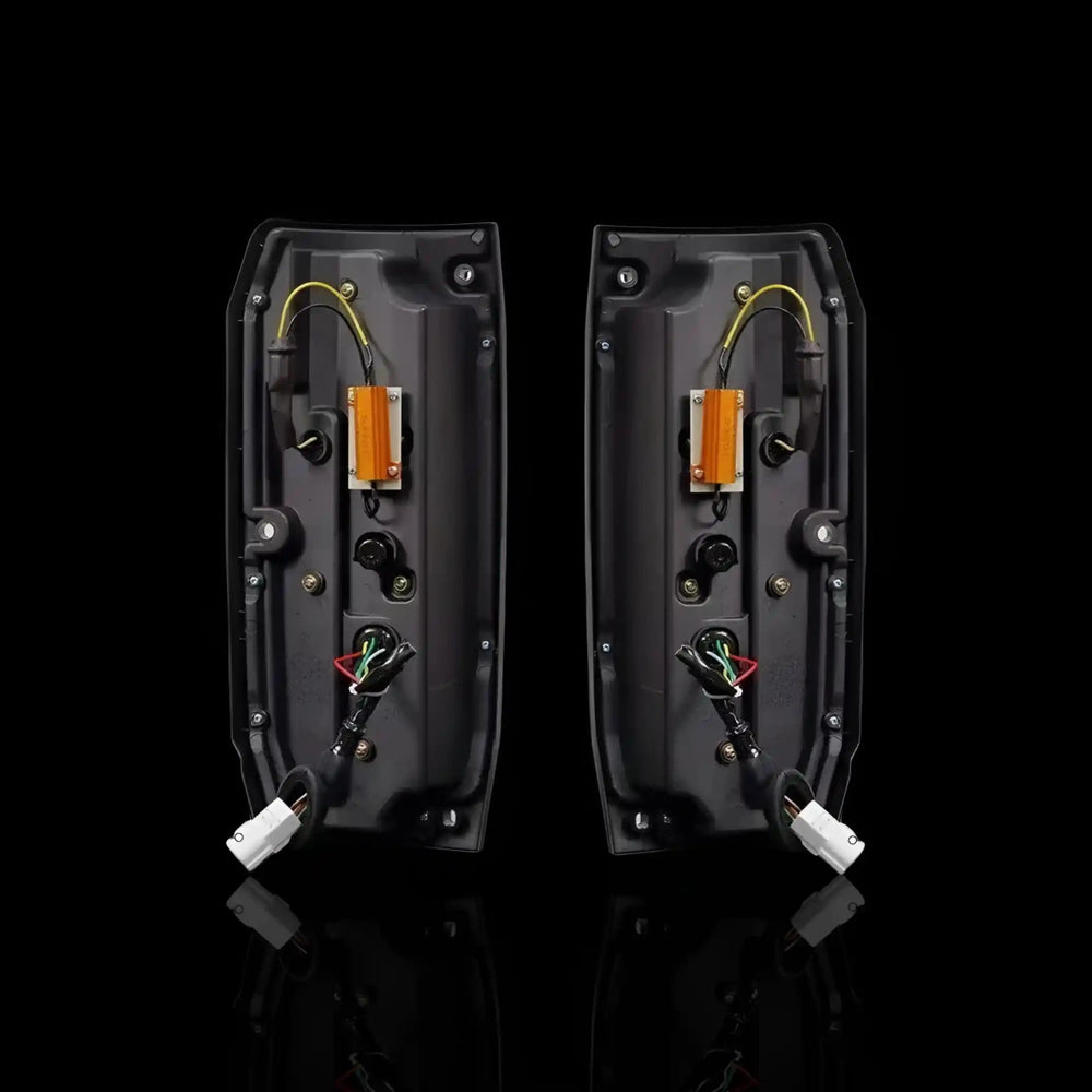 
                  
                    Sequential Halo LED Tail Lights – Fits Toyota LandCruiser 76 / 78 Series (2007–2022) | LH + RH Pair - Blckline Automotive
                  
                
