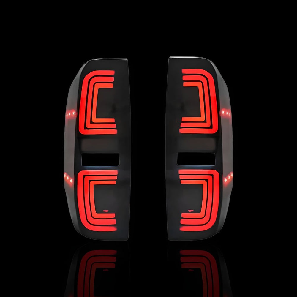
                  
                    Sequential Smoked Black LED Tail Lights – Fits Nissan Navara D40 (2005–2015) | LH + RH Pair - Blckline Automotive
                  
                