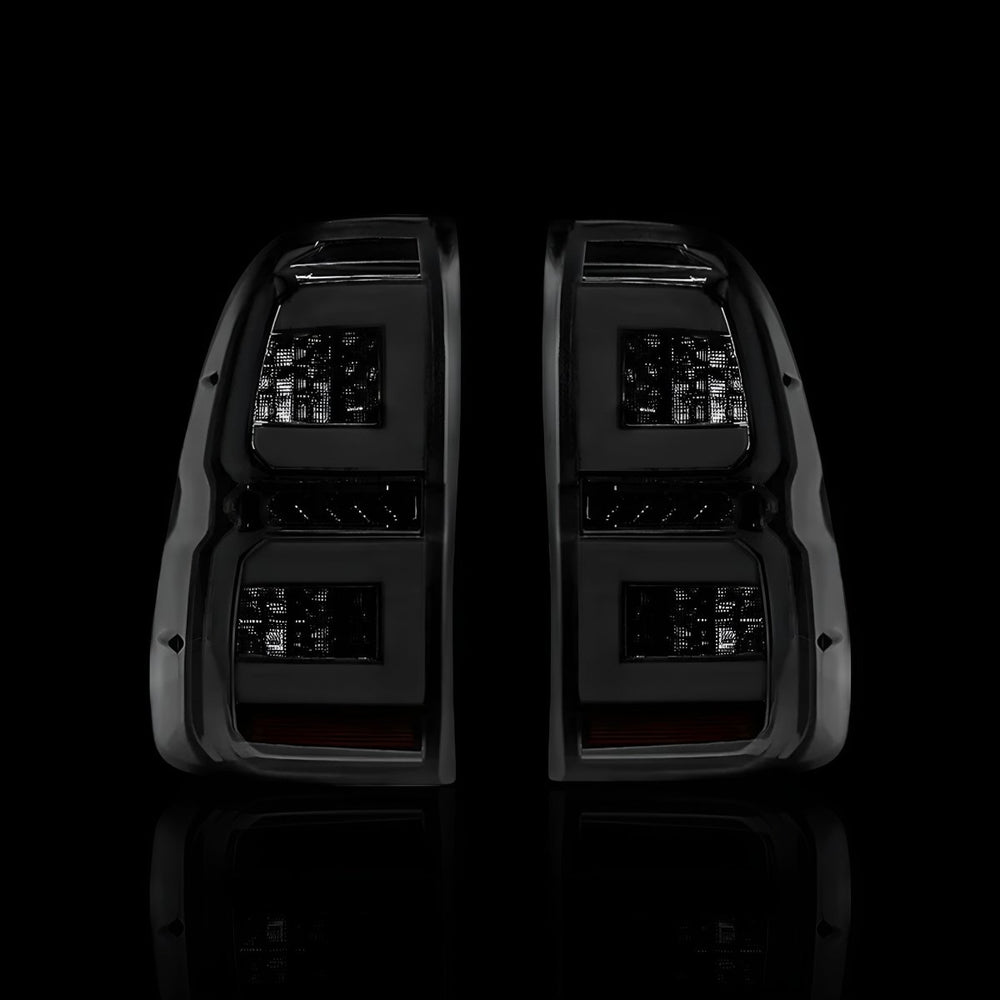 
                  
                    Sequential Smoked C - Style LED Tail Lights – Fits Toyota Hilux N80 (2015–2024) | LH + RH Pair - Blckline Automotive
                  
                