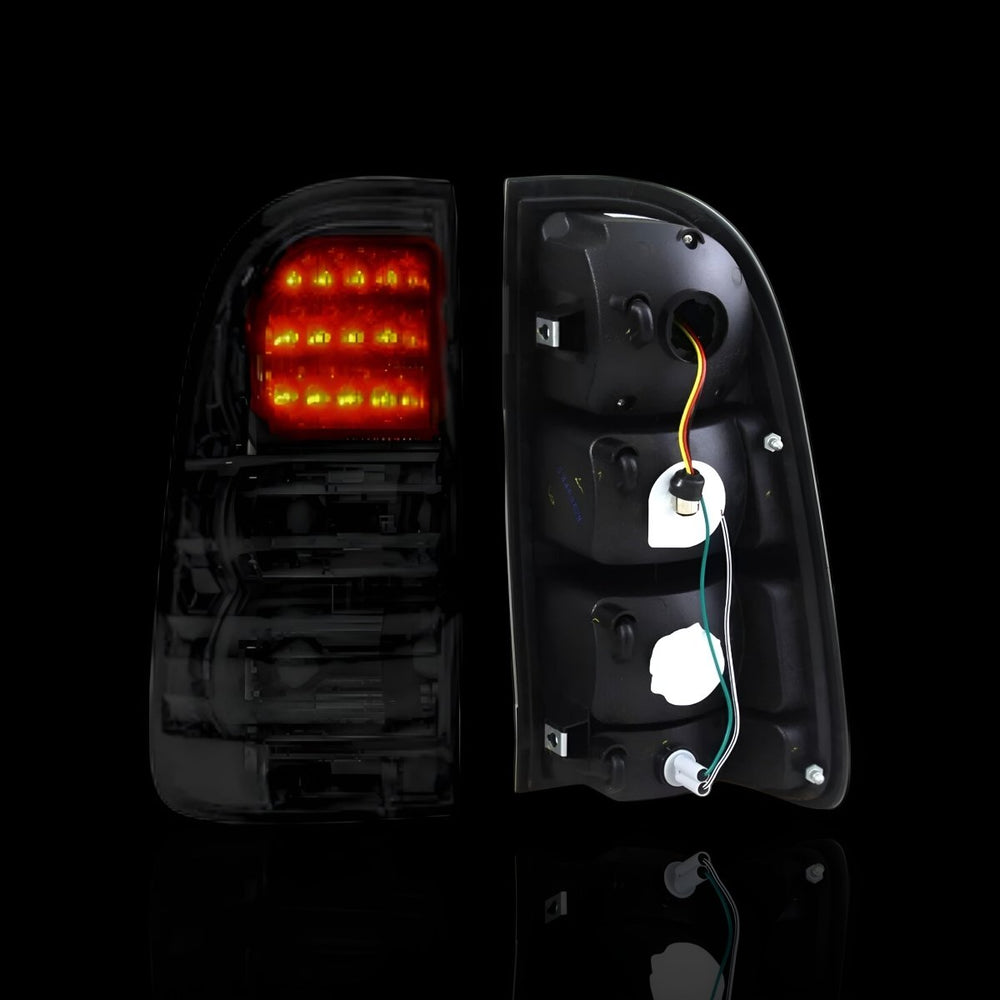 
                  
                    Smoked Black LED Tail Lights – Fits Toyota Hilux N70 / Vigo (2005–2014) | LH + RH Pair - Blckline Automotive
                  
                