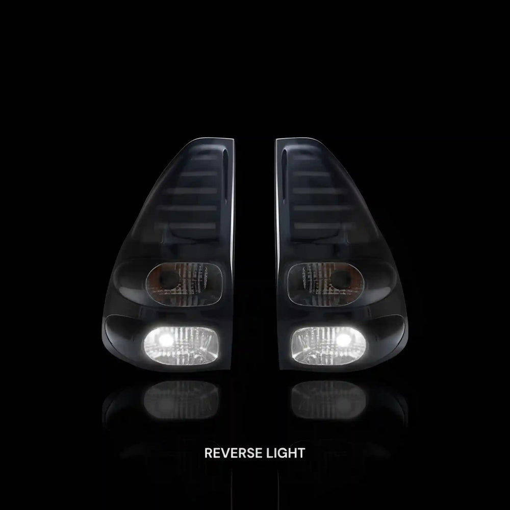 
                  
                    Smoked Black LED Tail Lights – Fits Toyota Prado 120 Series (2003–2009) | LH + RH Pair - Blckline Automotive
                  
                