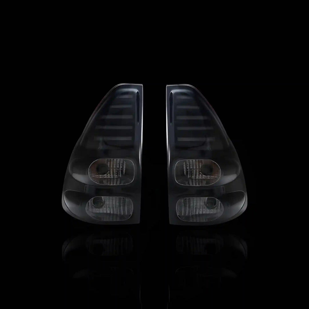 
                  
                    Smoked Black LED Tail Lights – Fits Toyota Prado 120 Series (2003–2009) | LH + RH Pair - Blckline Automotive
                  
                
