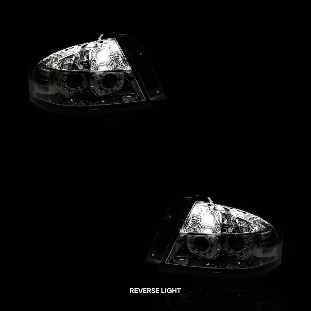 
                  
                    Smoked LED Altezza Tail Lights – Fits Ford Falcon BA / BF (2002 - 2007) | LH + RH Pair - Blckline Automotive
                  
                