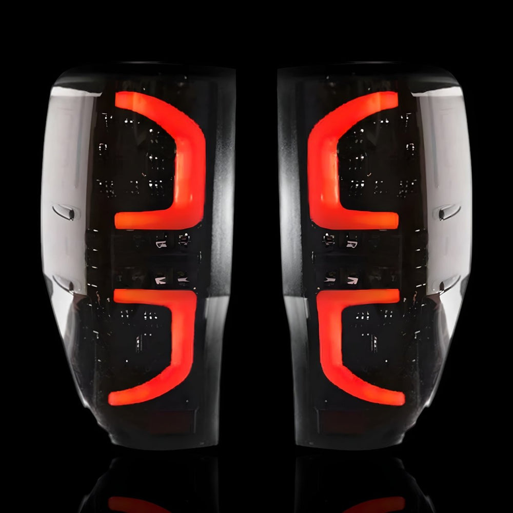 
                  
                    Smoked Tail Lights – Fits Ford Ranger Wildtrak PX MK1 / MK2 / MK3 (2011–2020) | LH + RH Pair - Blckline Automotive
                  
                